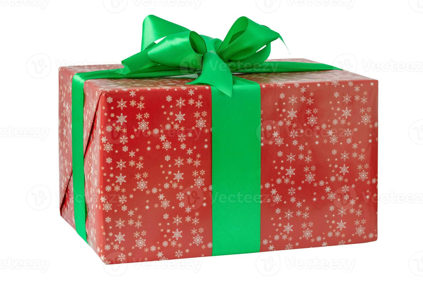 Red holiday Christmas box with green ribbon on the white background photo