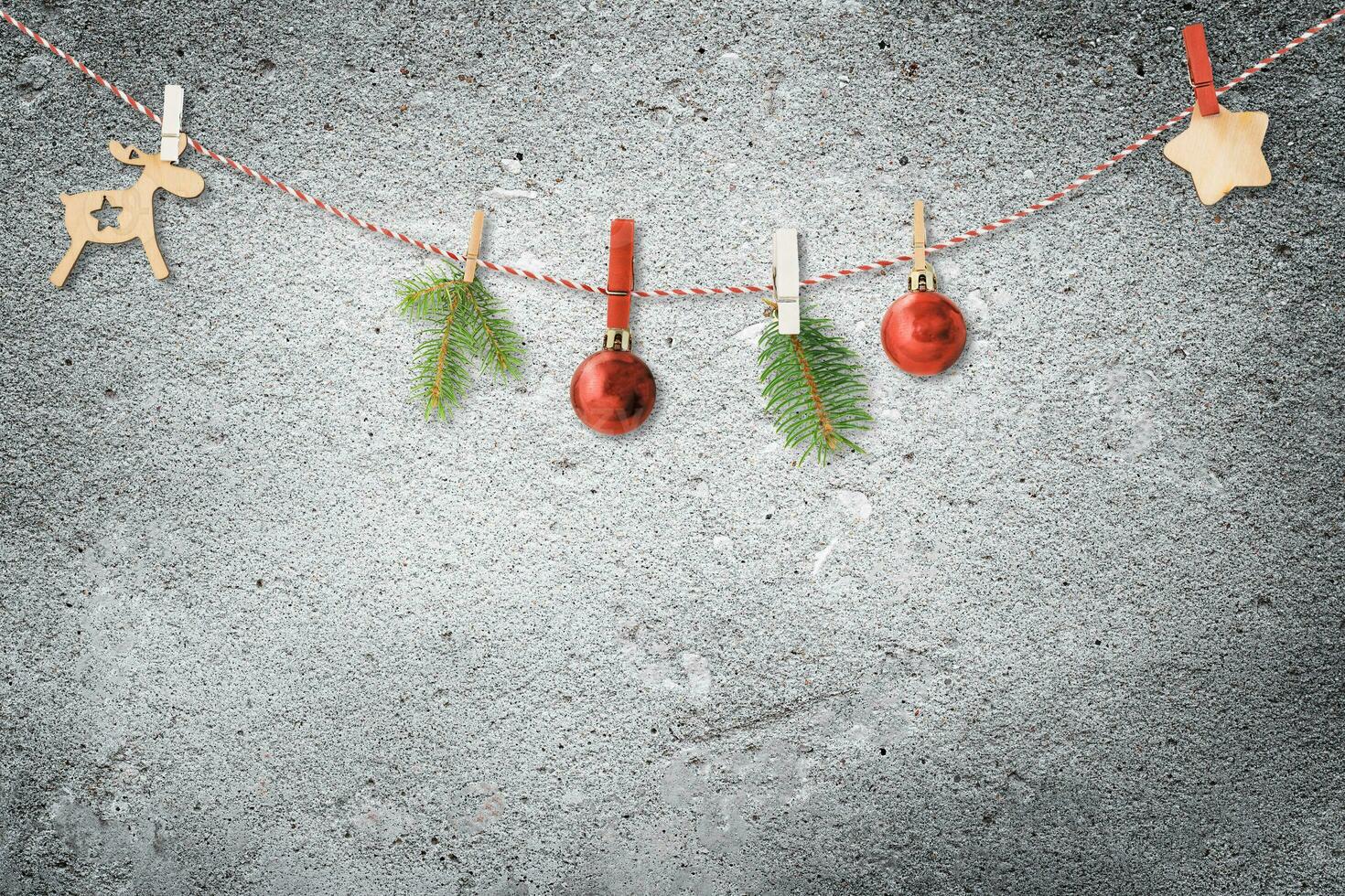 Christmas garland on concrete background photo