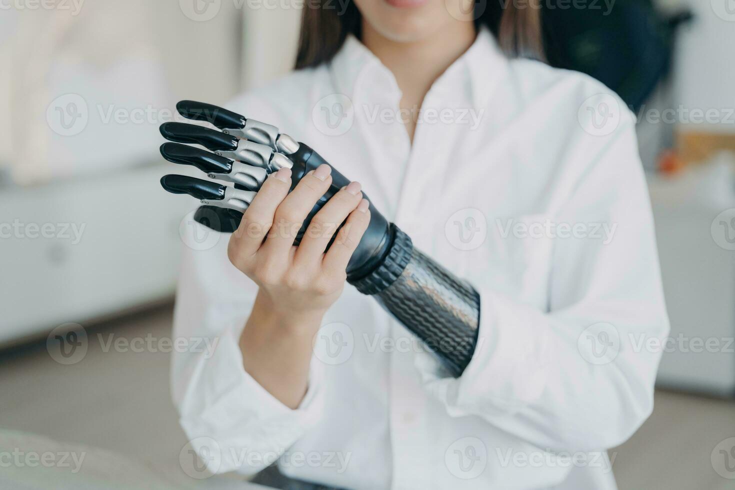 Embracing the future with a bionic hand, the epitome of human-technology synergy photo