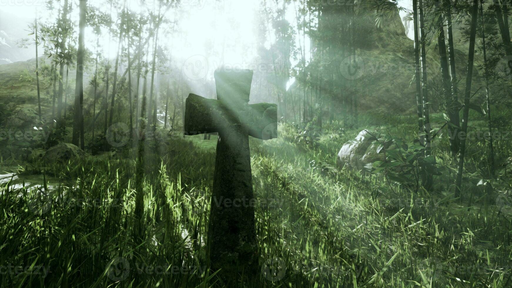 A rough-hewn stone cross amidst the jungle foliage photo