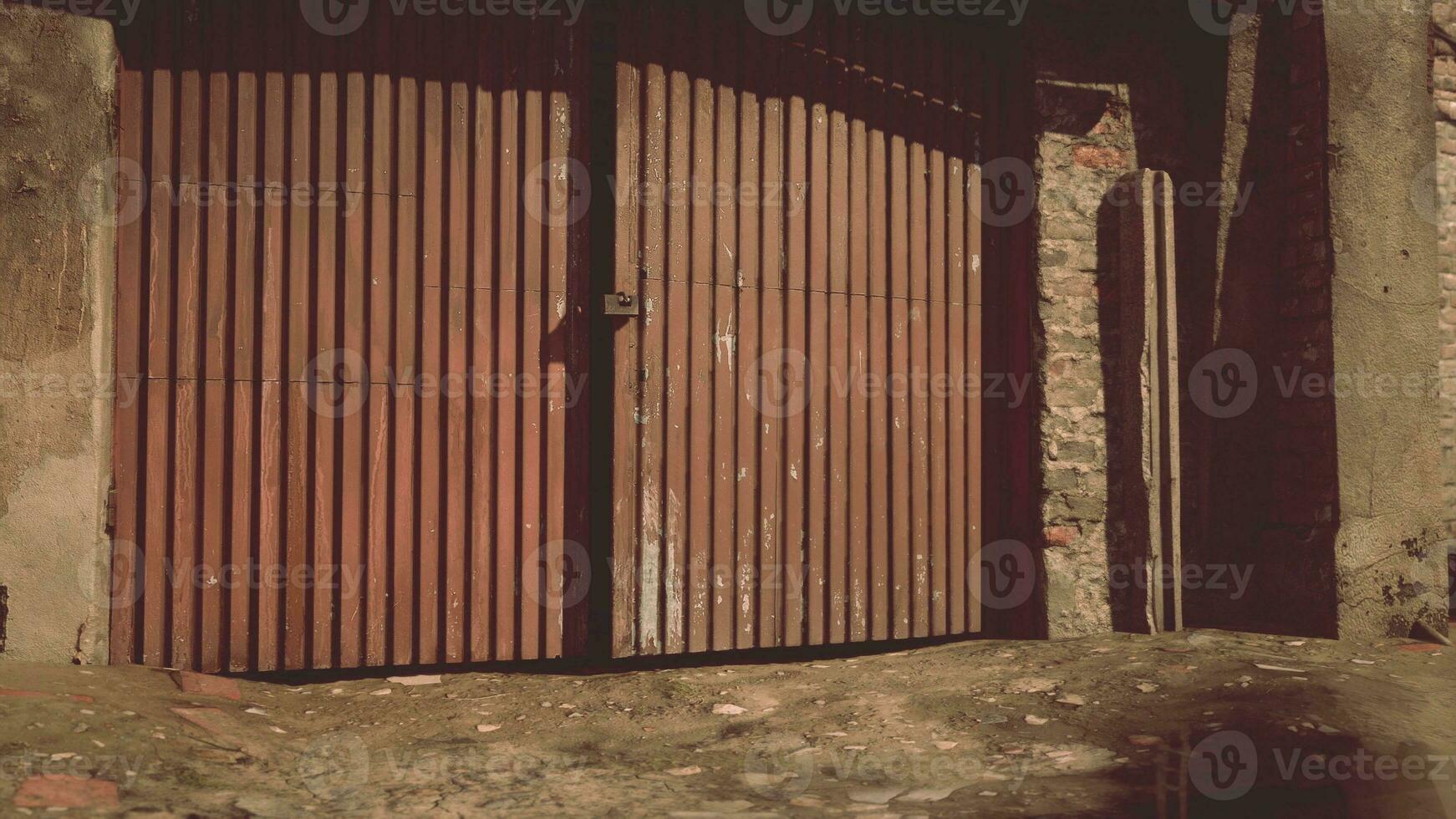 Old abandoned industrial street view with brick facades photo