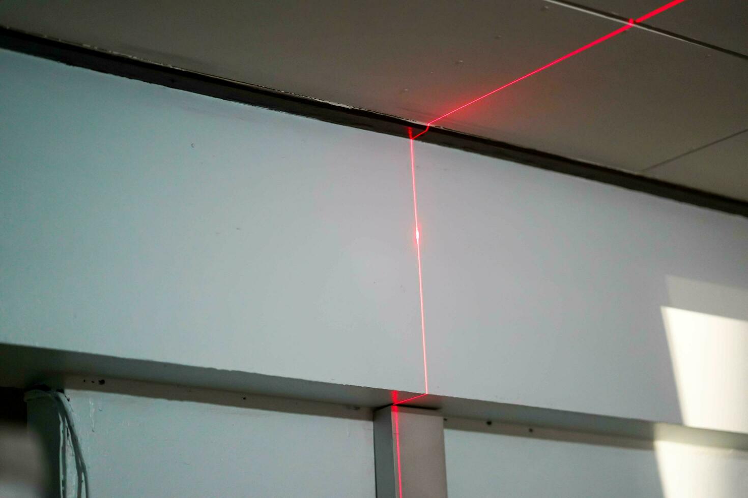 Laser rangefinder in home renovation work photo