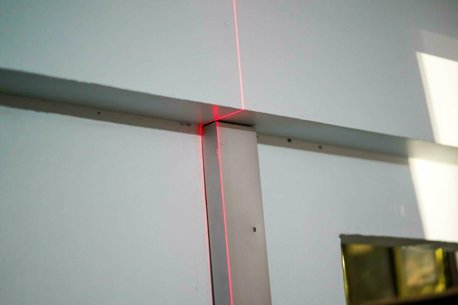 Laser rangefinder in home renovation work photo