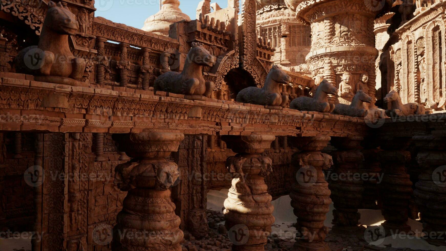 A group of statues displayed on a wooden table in a temple photo