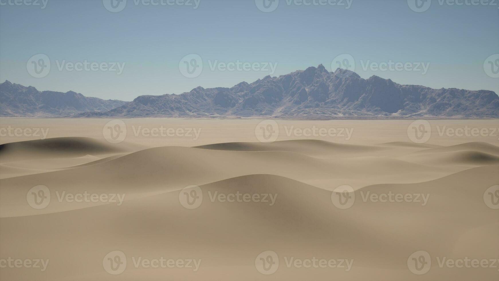 A desert landscape with mountains in the distance photo