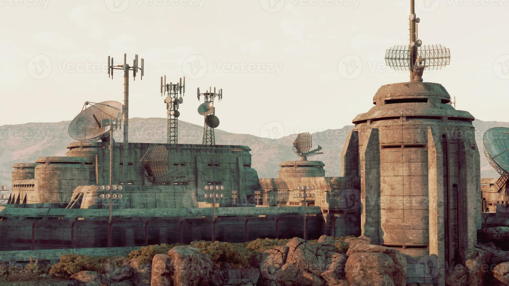 A cluster of antennas on a rooftop at a military base photo