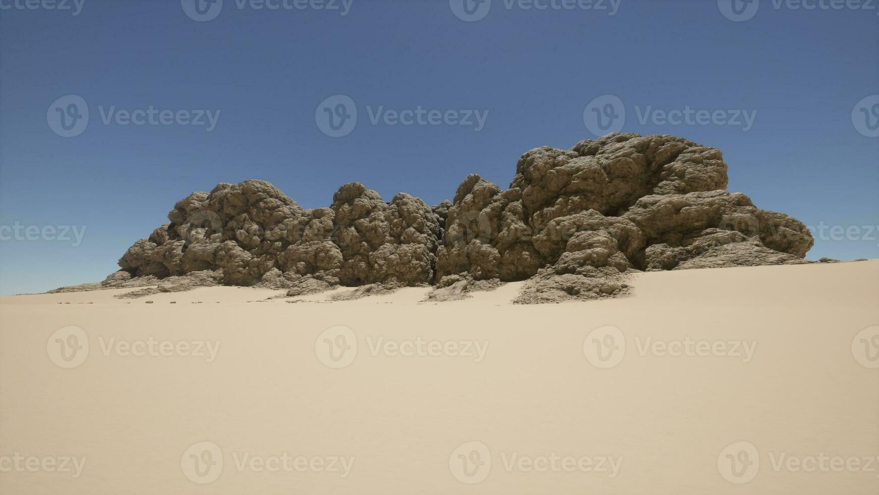 A large rock formation in the middle of a desert photo