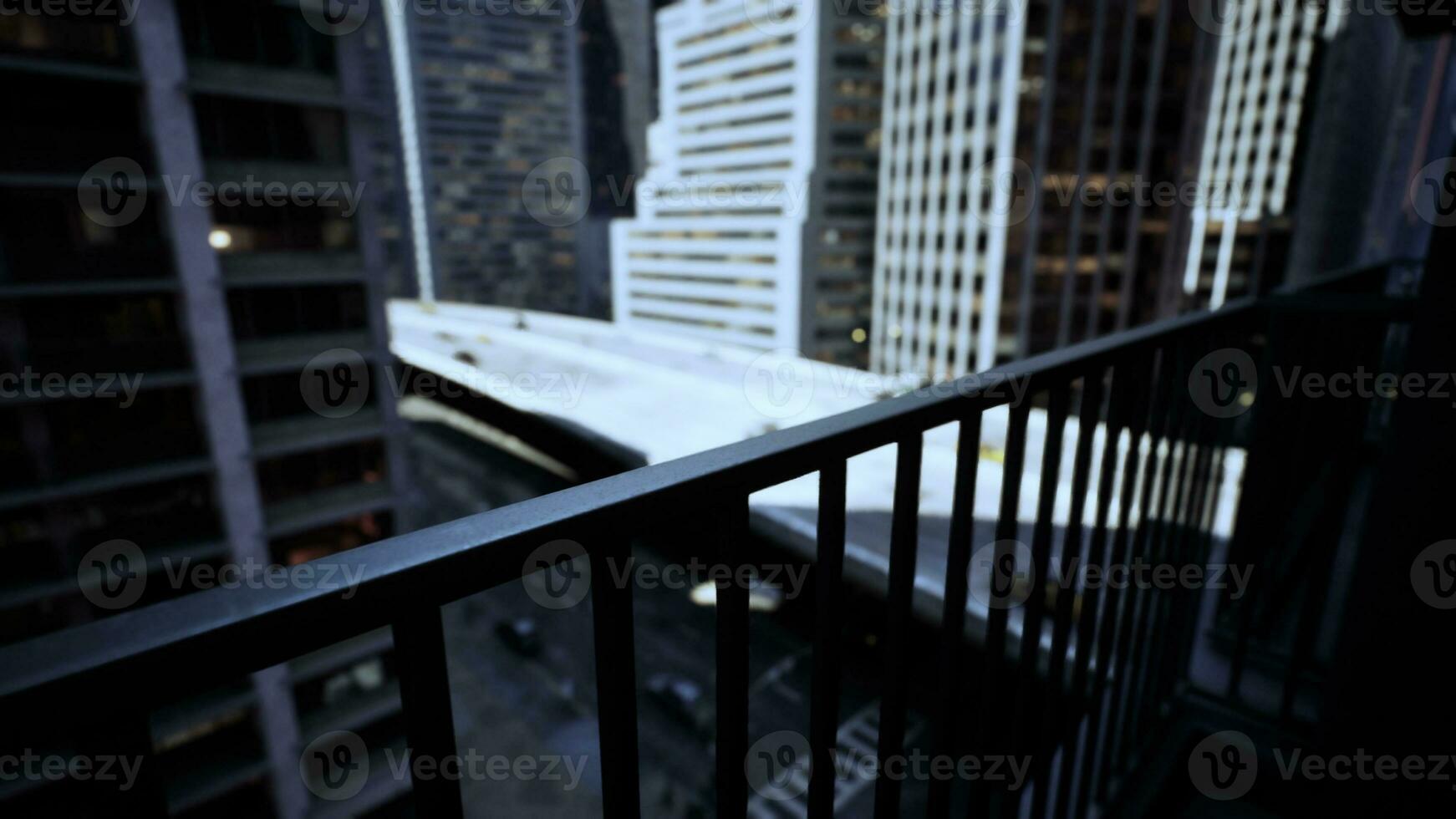 cityscape captured from a balcony overlooking the bustling streets below photo