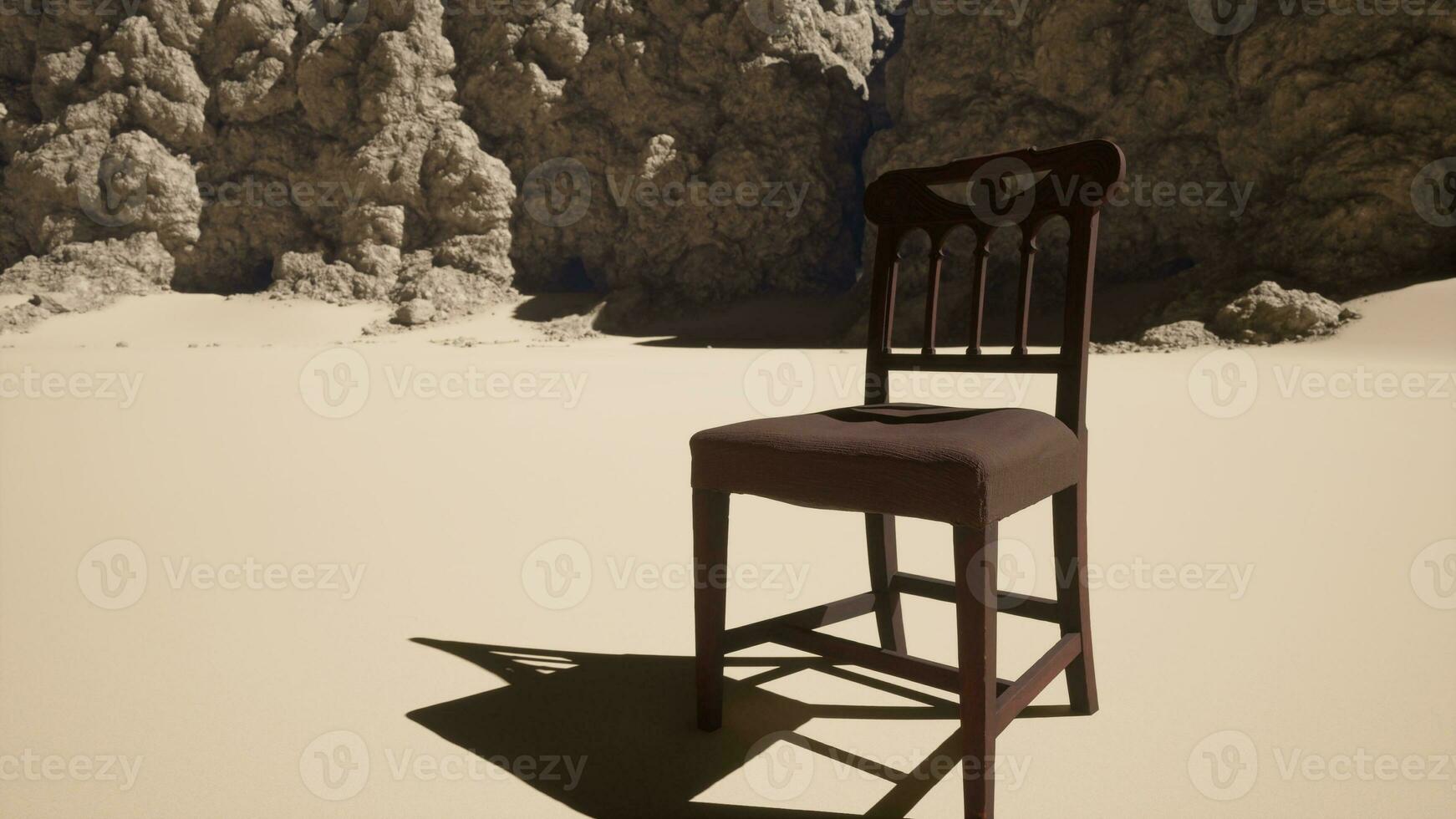 un silla ese es sentado en el arena foto