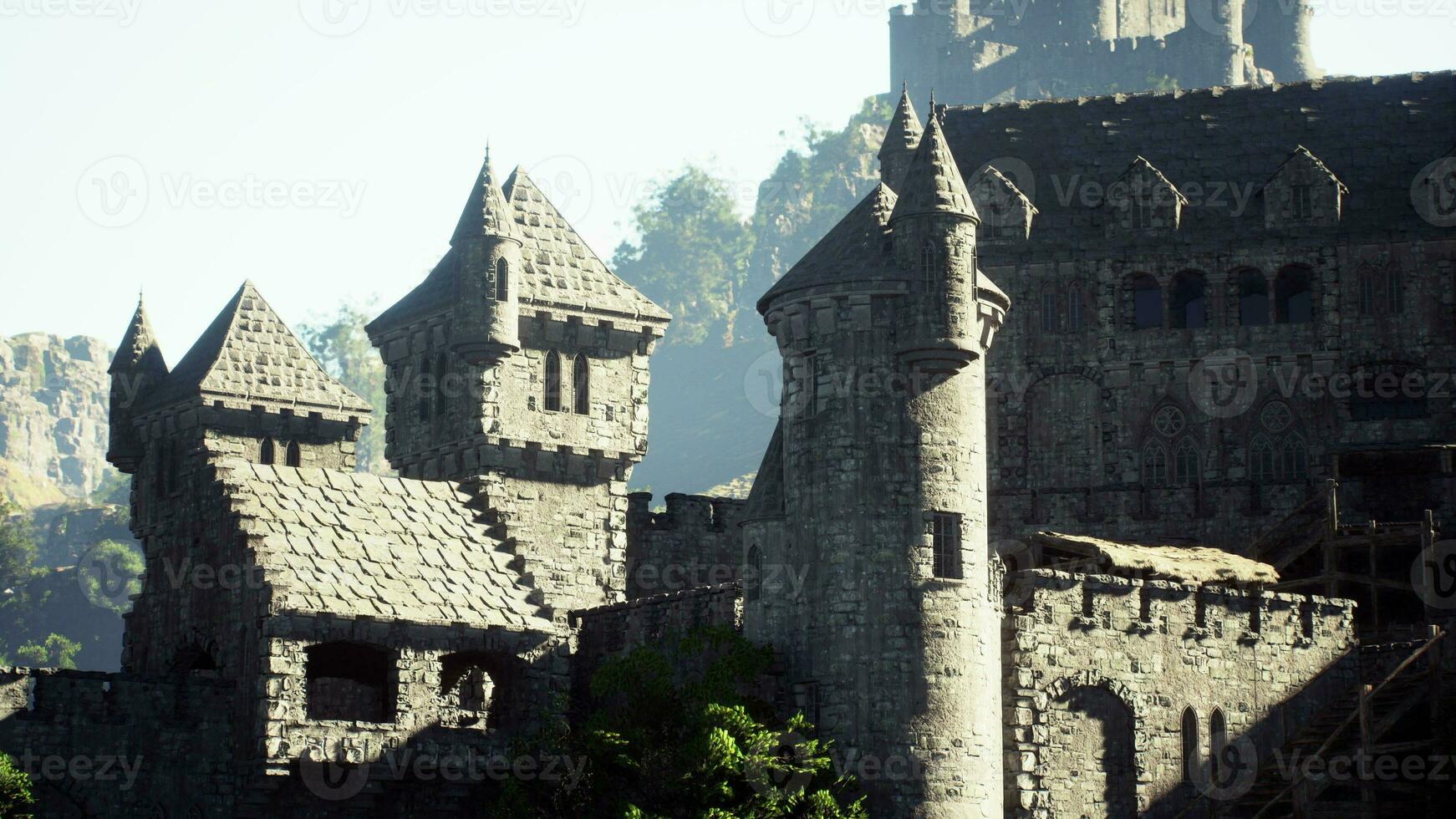 Old ruined castle in the misty mountains photo