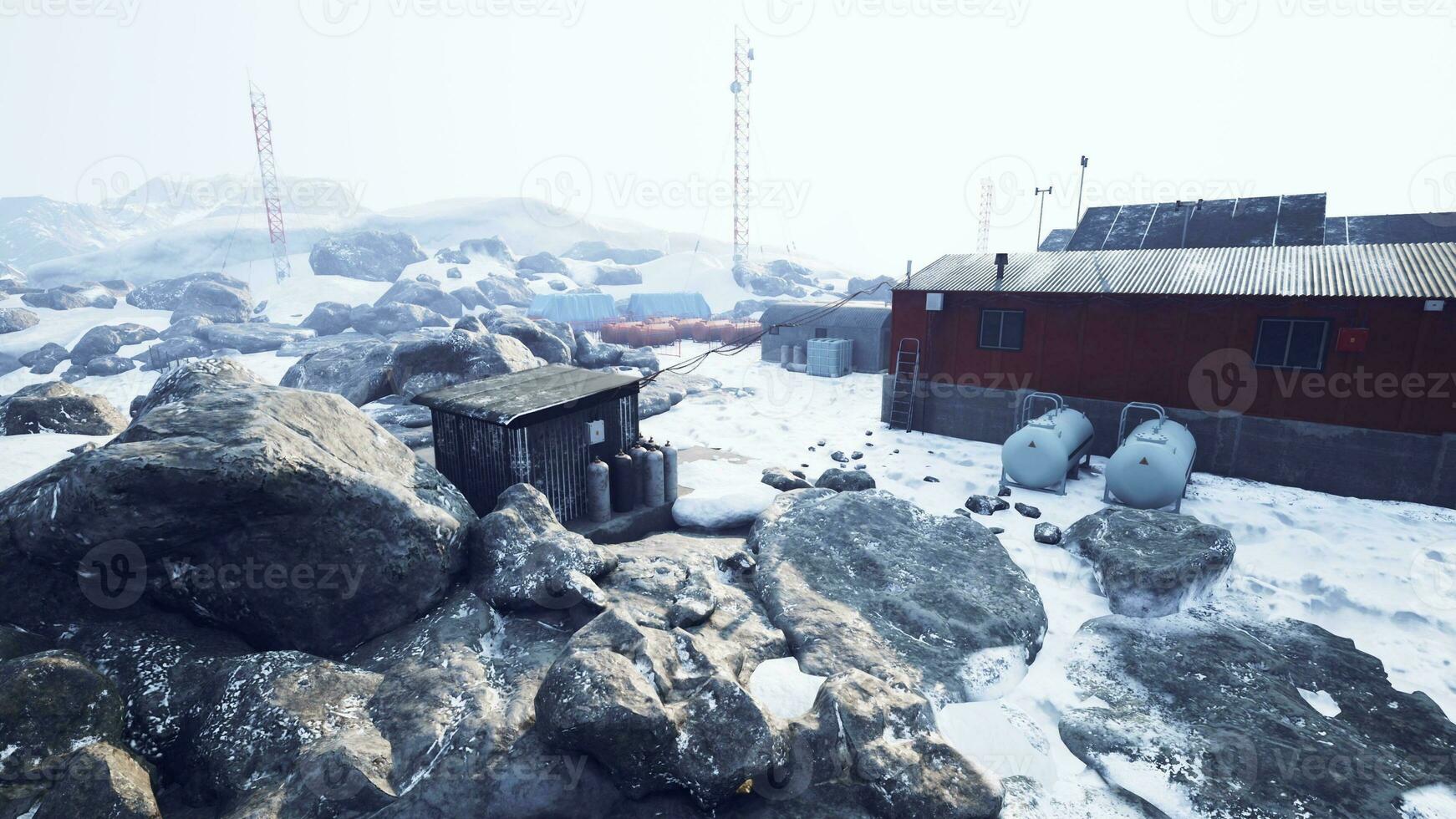 antarctic base set in a natural harbor in front of the Antarctic Peninsula photo
