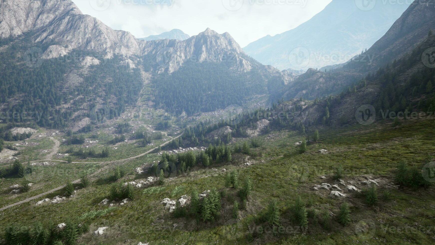 breathtaking aerial view of a majestic valley nestled between towering mountains photo