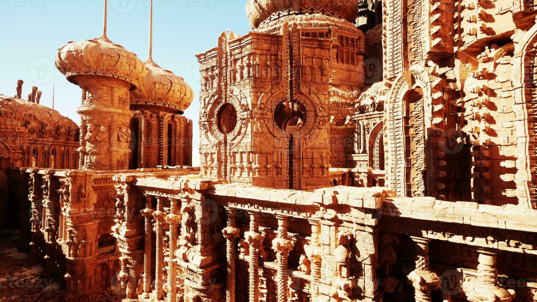 detailed view of the intricate stone carvings on the walls of an ancient temple photo