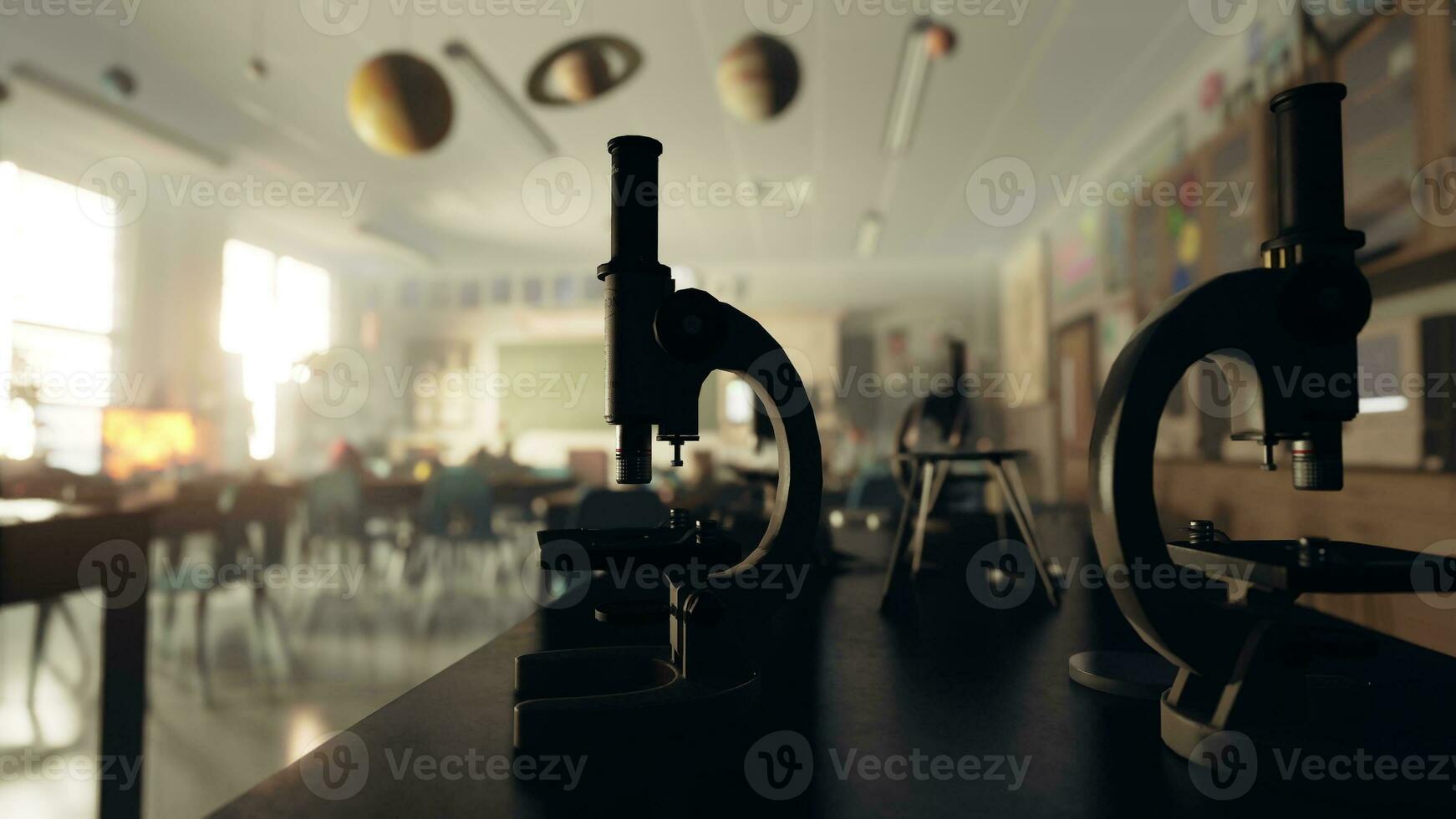 Two microscopes sitting on top of a table in a room photo