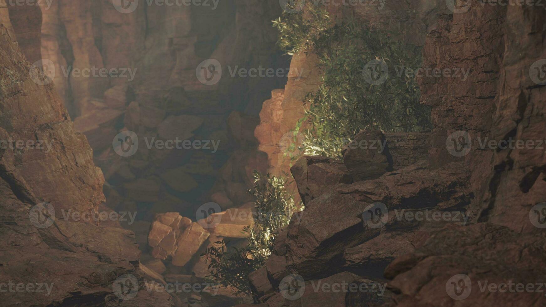 A majestic cave filled with an abundance of rocks and trees photo