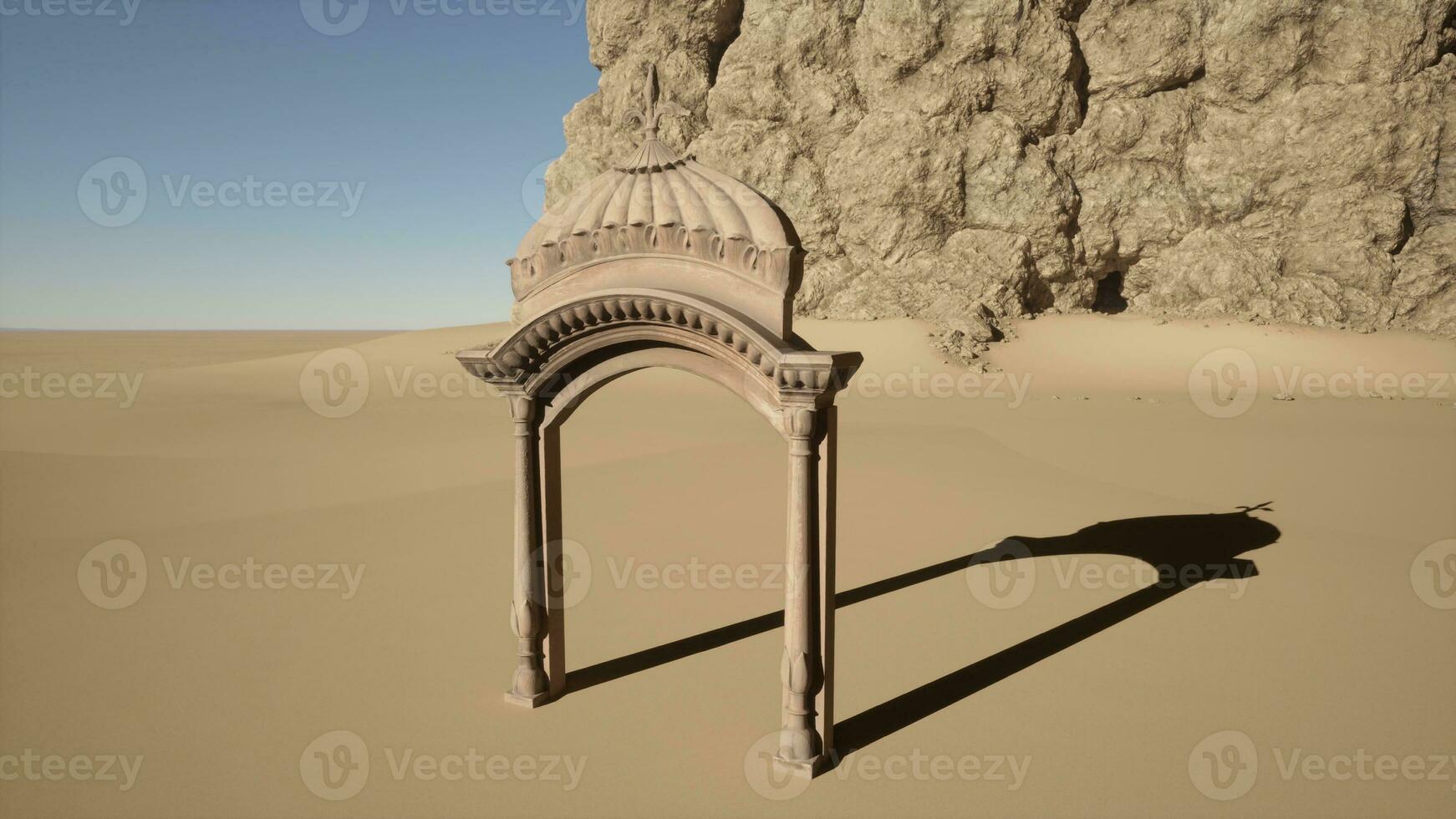 A stone structure in the middle of a desert photo