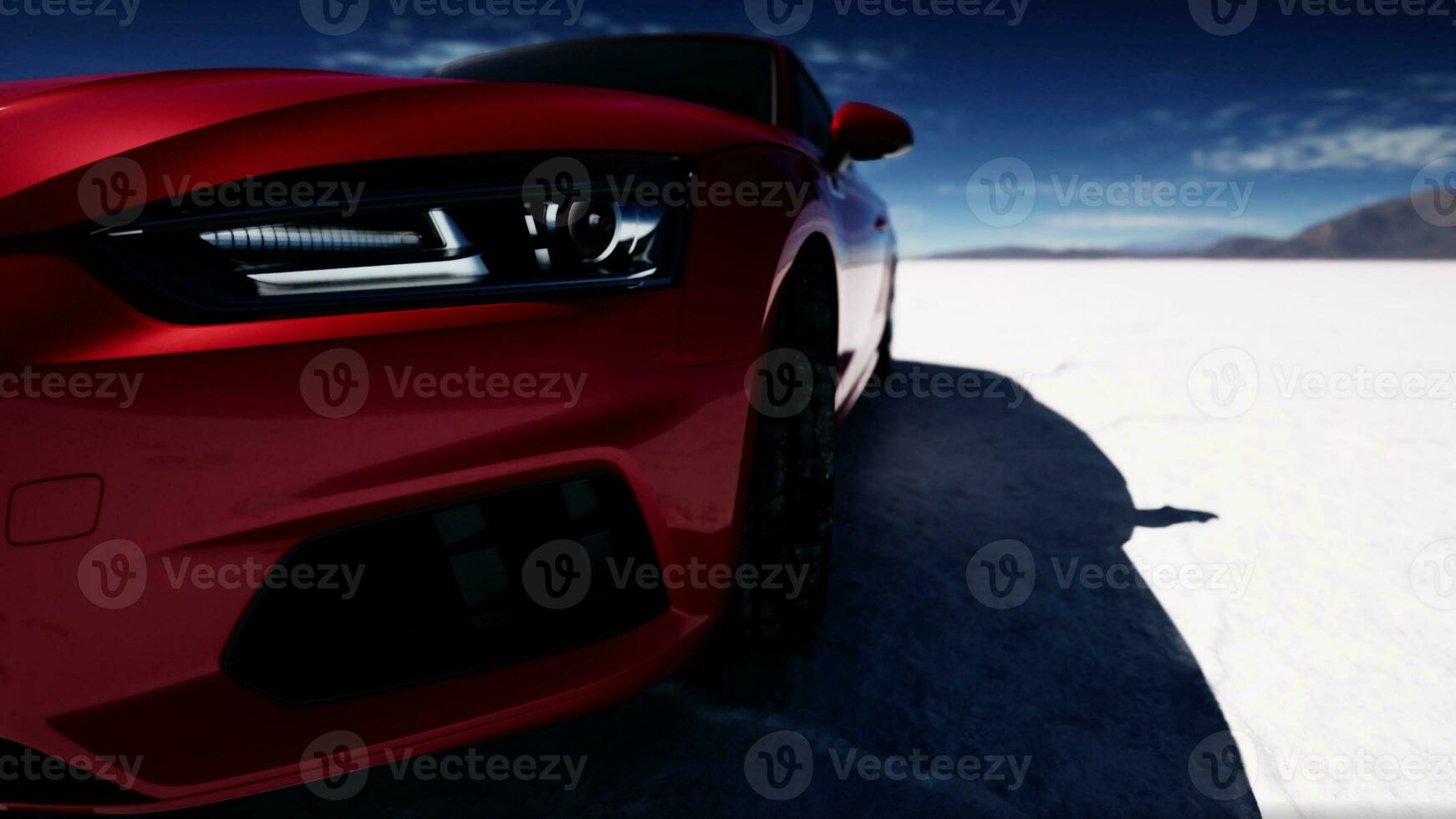 red sport car on the salt lake photo