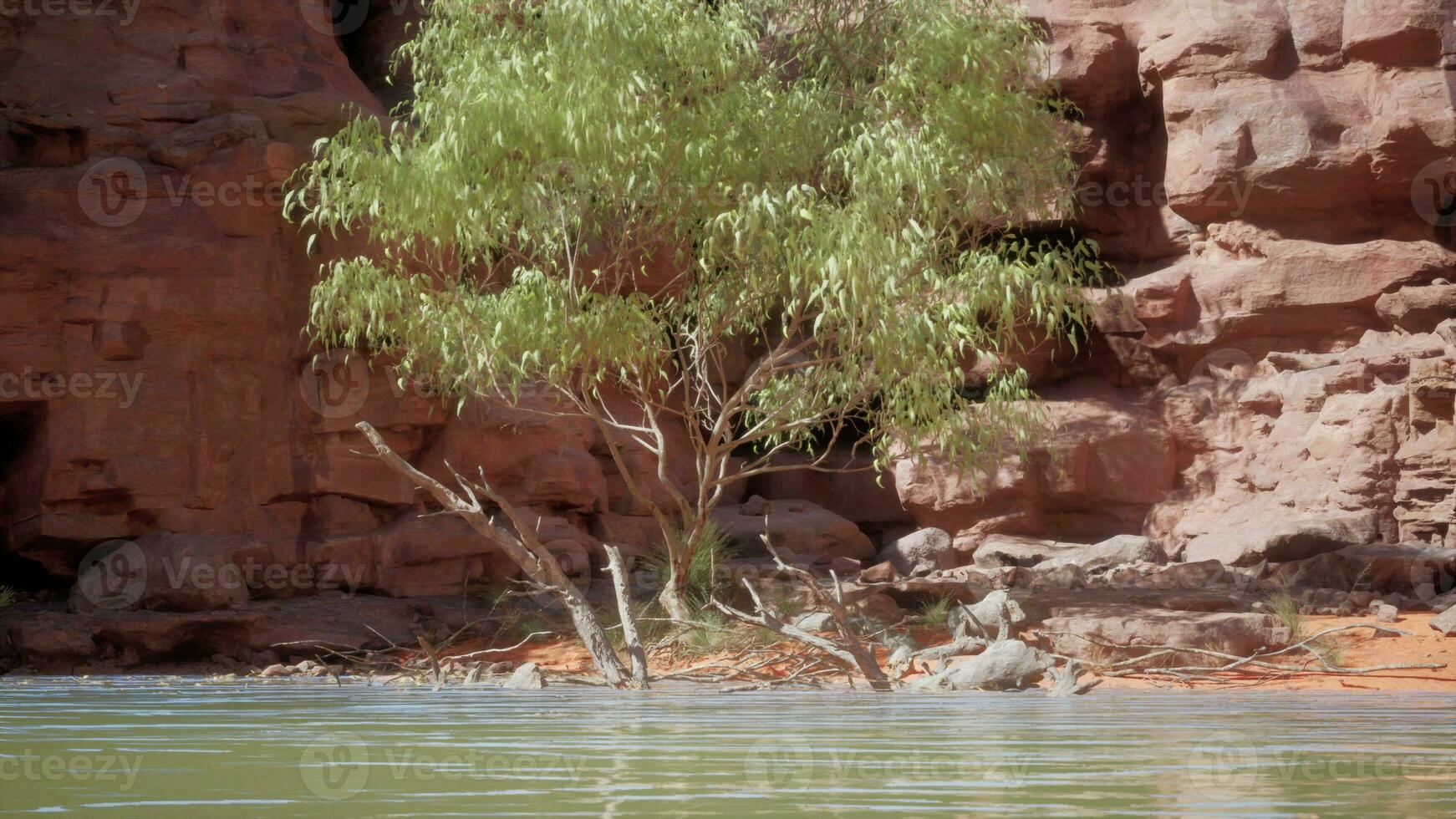 beautiful day on the river with sandstone cliffs and reflections photo