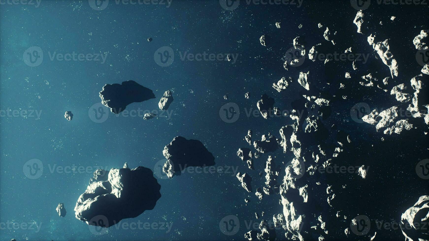 dangerous asteroid field stretching across a misty nebula photo