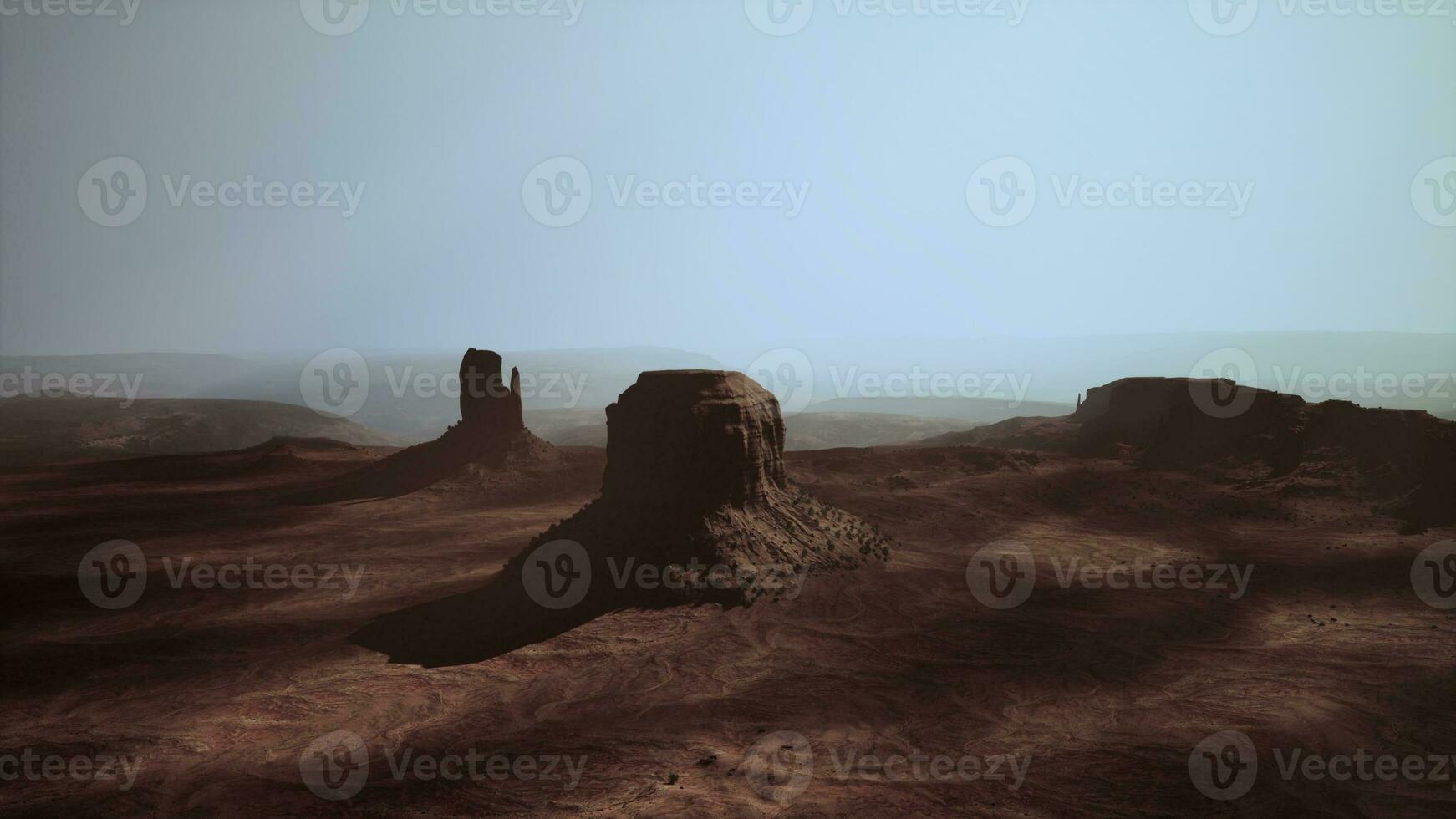 A stunning rock formation in the heart of the desert captured from above photo