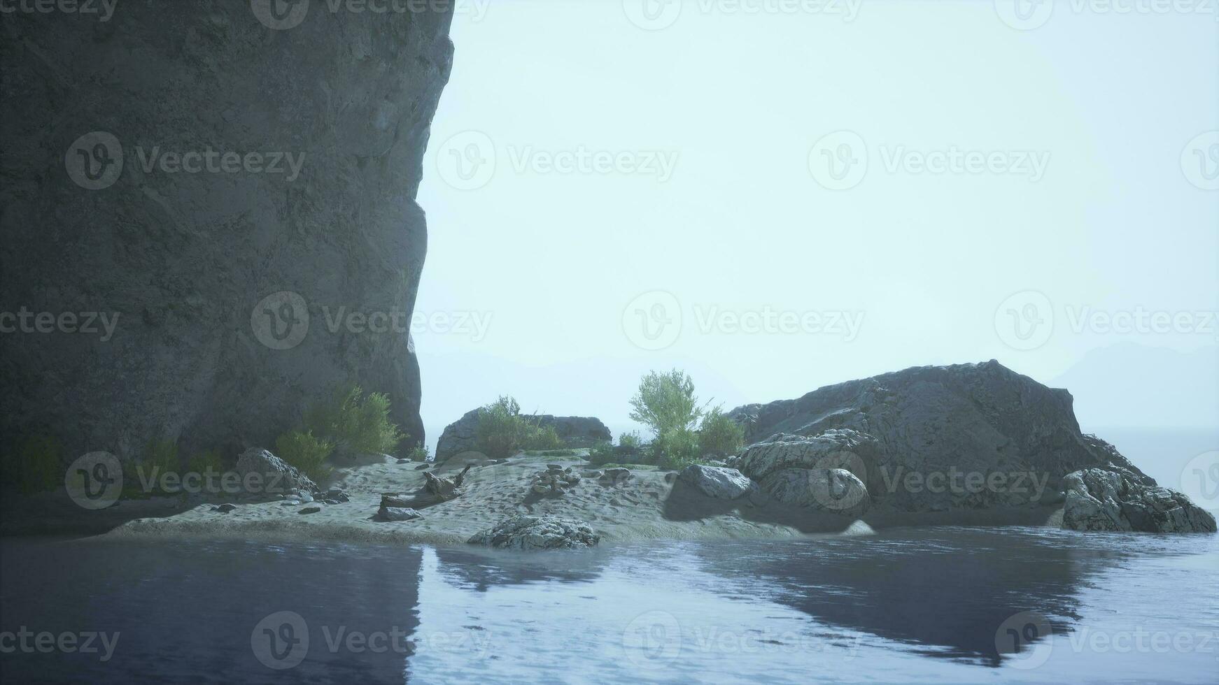 A serene lake nestled among towering rocks photo