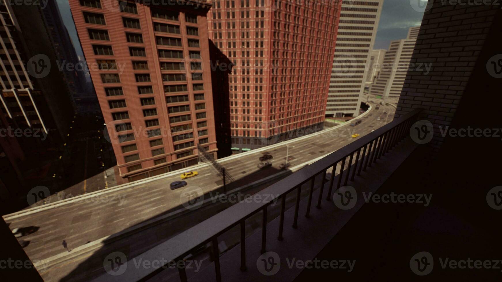 A city street captured from a bridge, showcasing the bustling urban life below photo