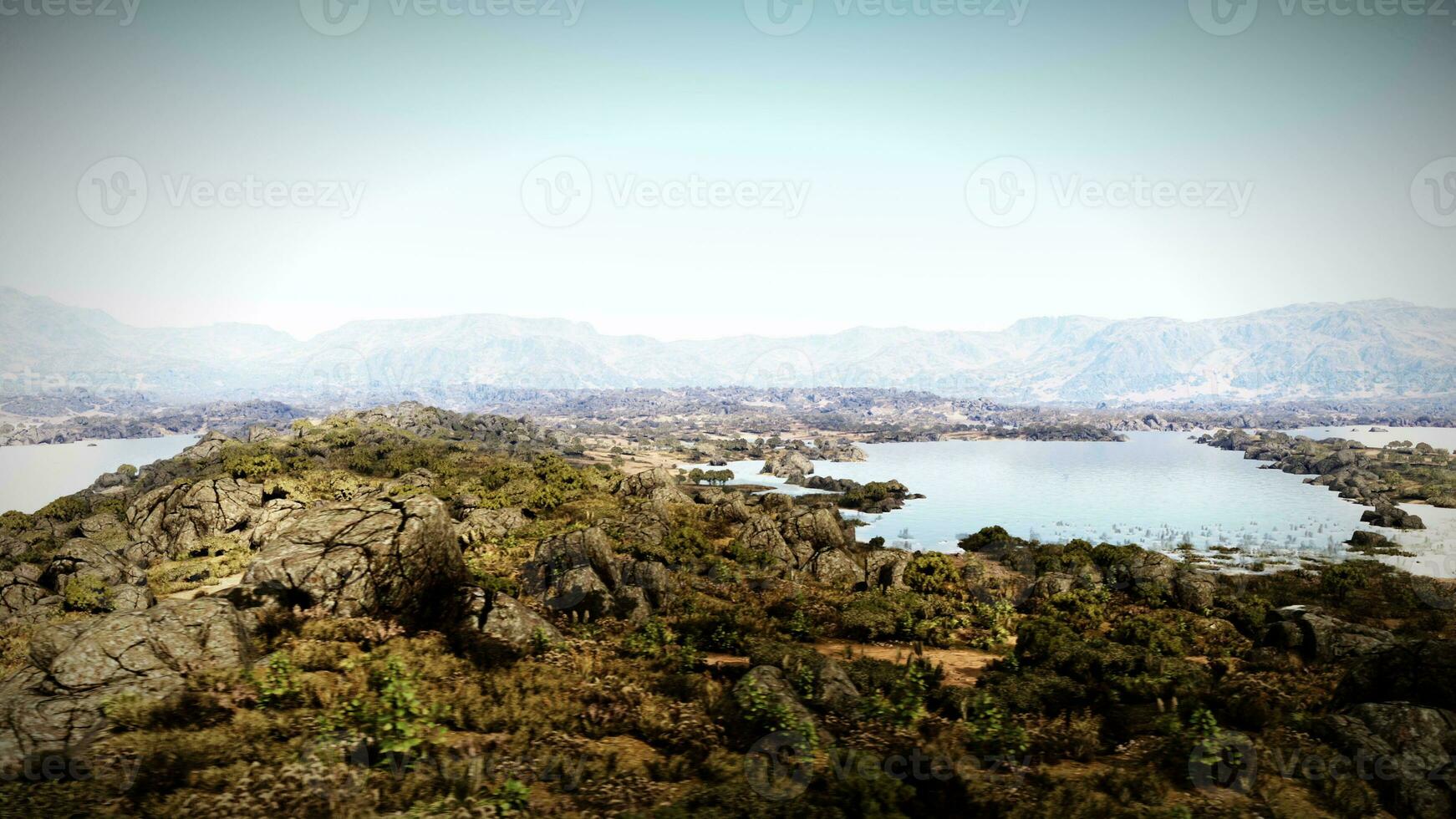 A serene lake nestled among majestic mountains photo