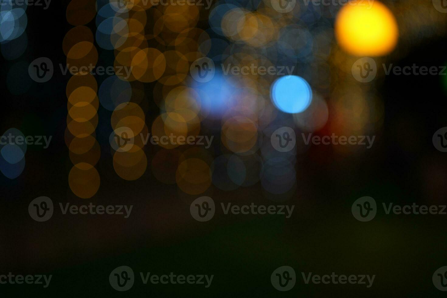 Christmas concept 2024 Bokeh background of lights from Christmas tree decorations in celebration photo