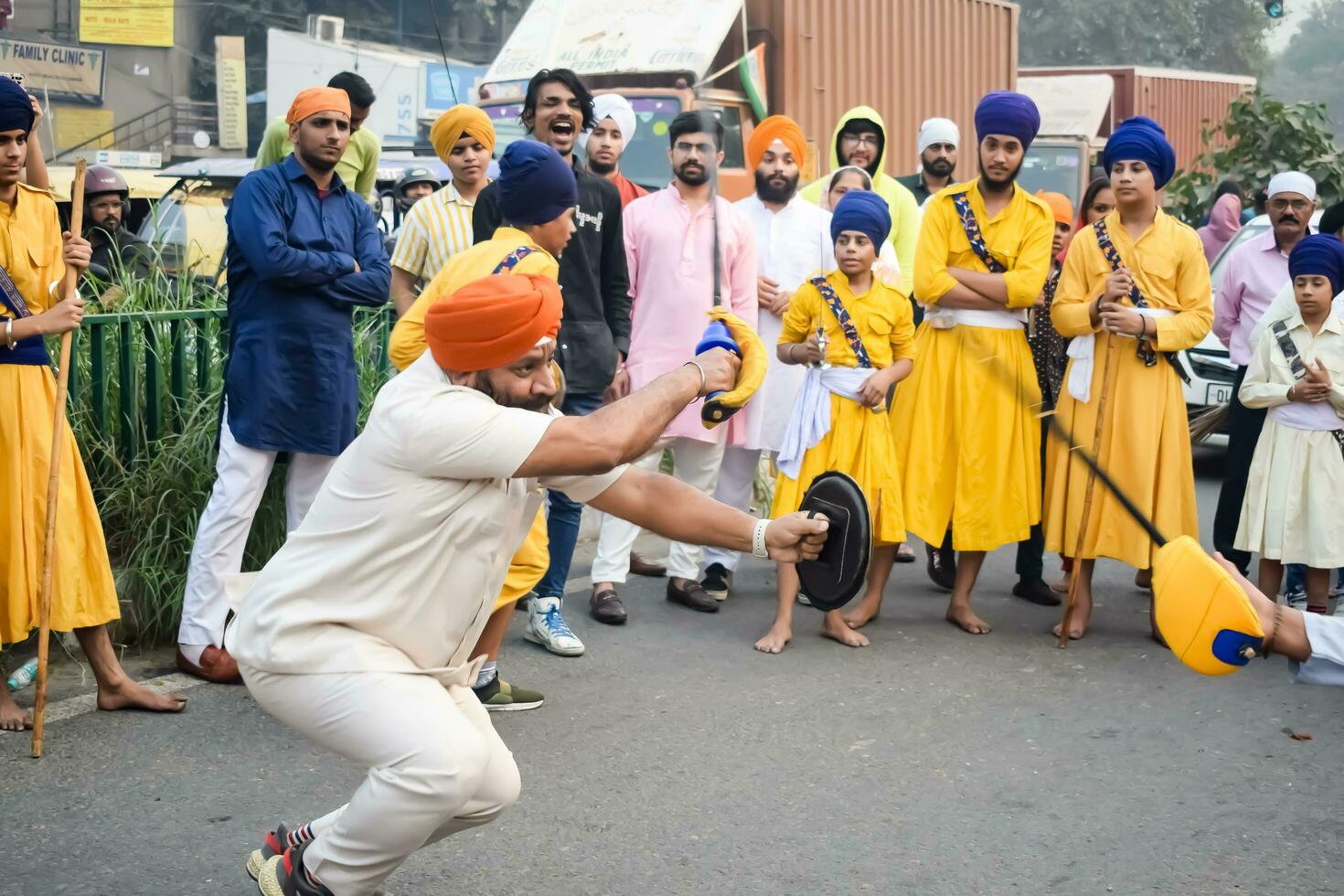 Delhi, India, October 2, 2023 - Sikhs display gatka and martial arts during annual Nagar Kirtan, Traditional, procession on account of birthday of Guru Nanak Dev ji, Nagar Kirtan in East Delhi area photo