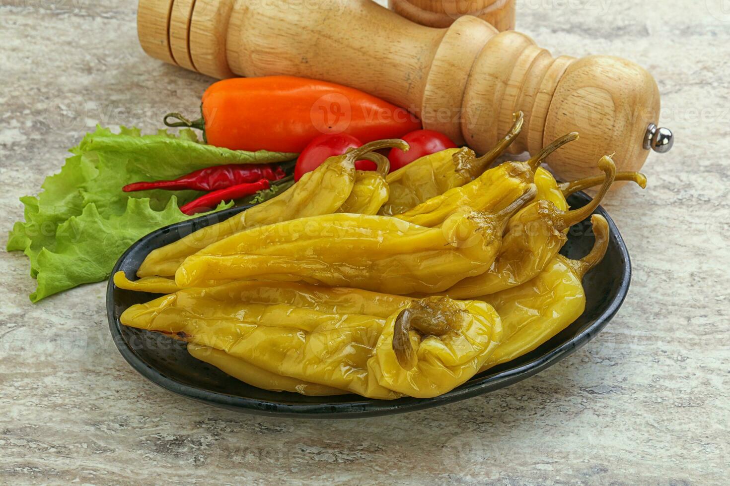 Pickled marinated spicy green pepper photo