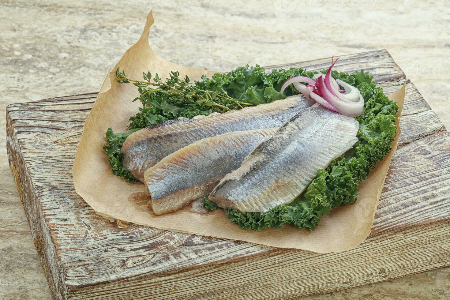 Marinated Herring fillet with onion photo