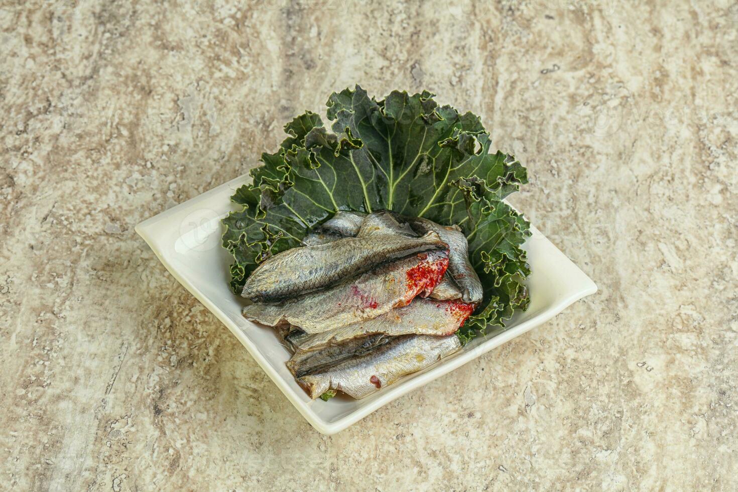 Anchovy - small fish appetizer snack photo