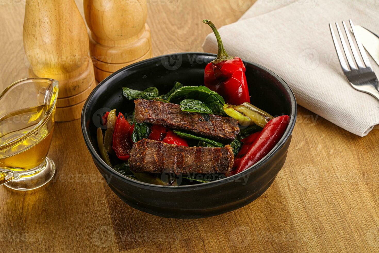 Salad with grilled beef steak photo