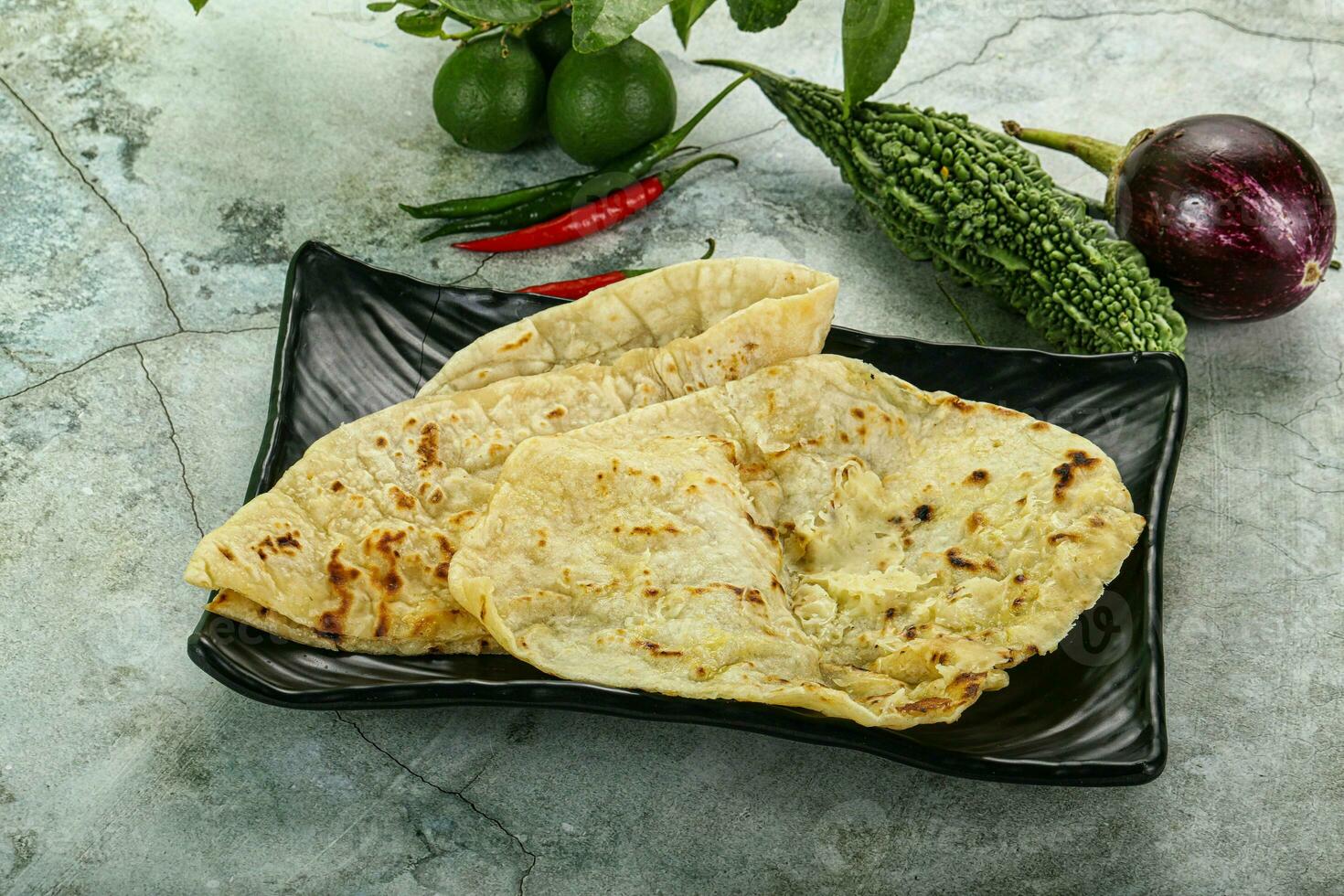 Indian tandori bread - naan with cheese photo