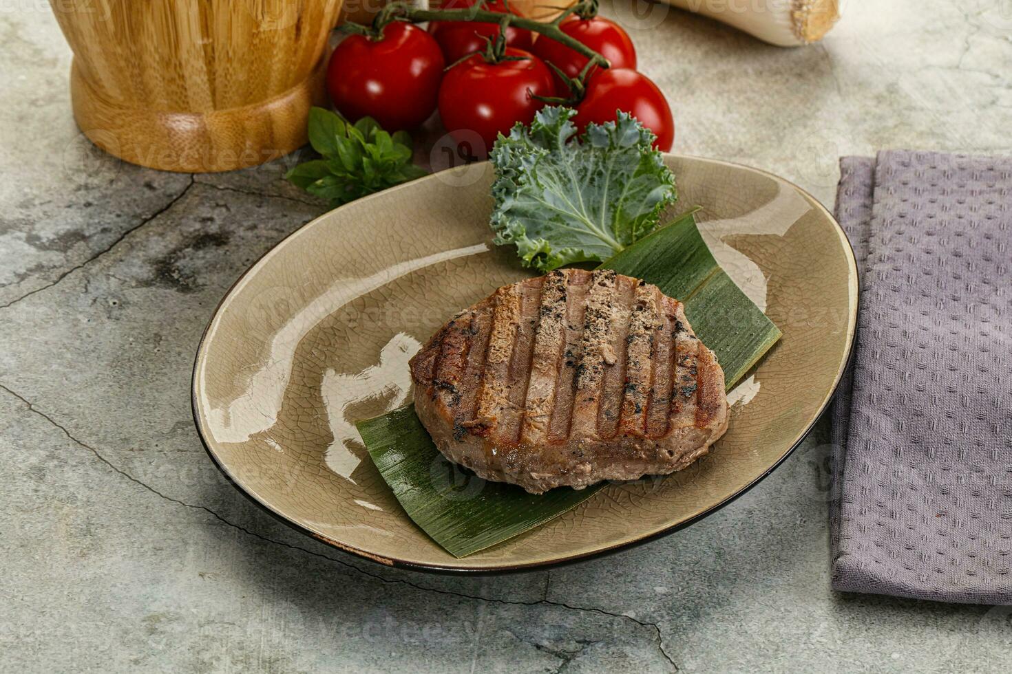 Grilled tuna medallion in the plate 35124006 Stock Photo at Vecteezy