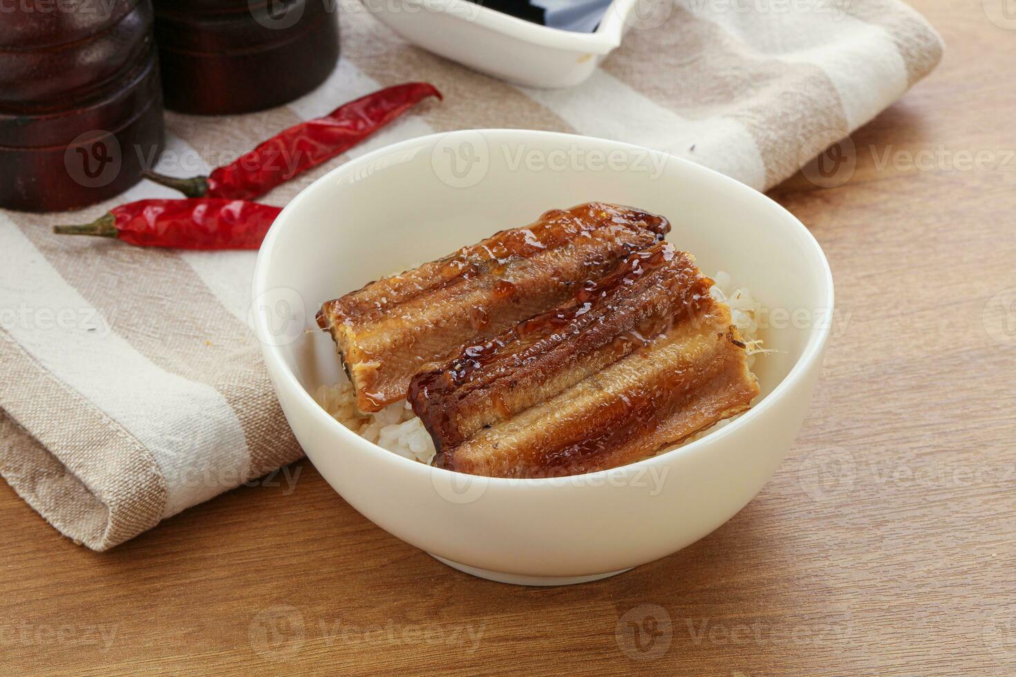 Roasred eel with steamed rice photo