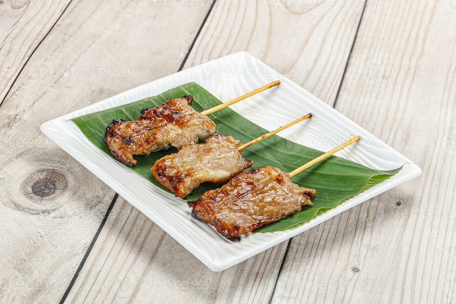 Thai cuisine - grilled pork skewer photo