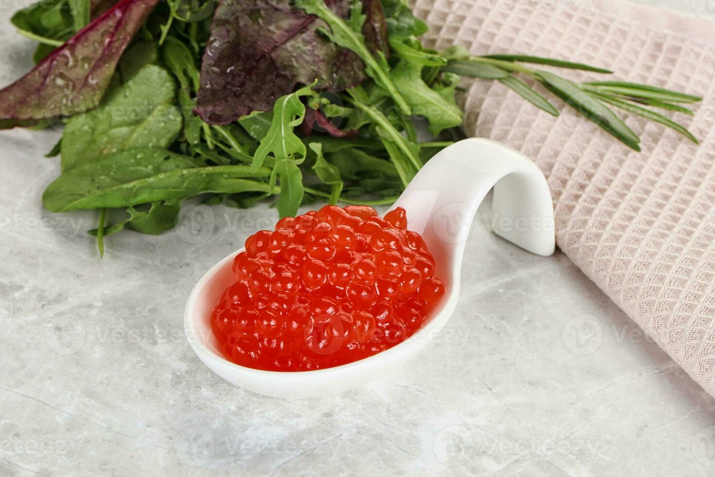 Red caviar in the bowl photo