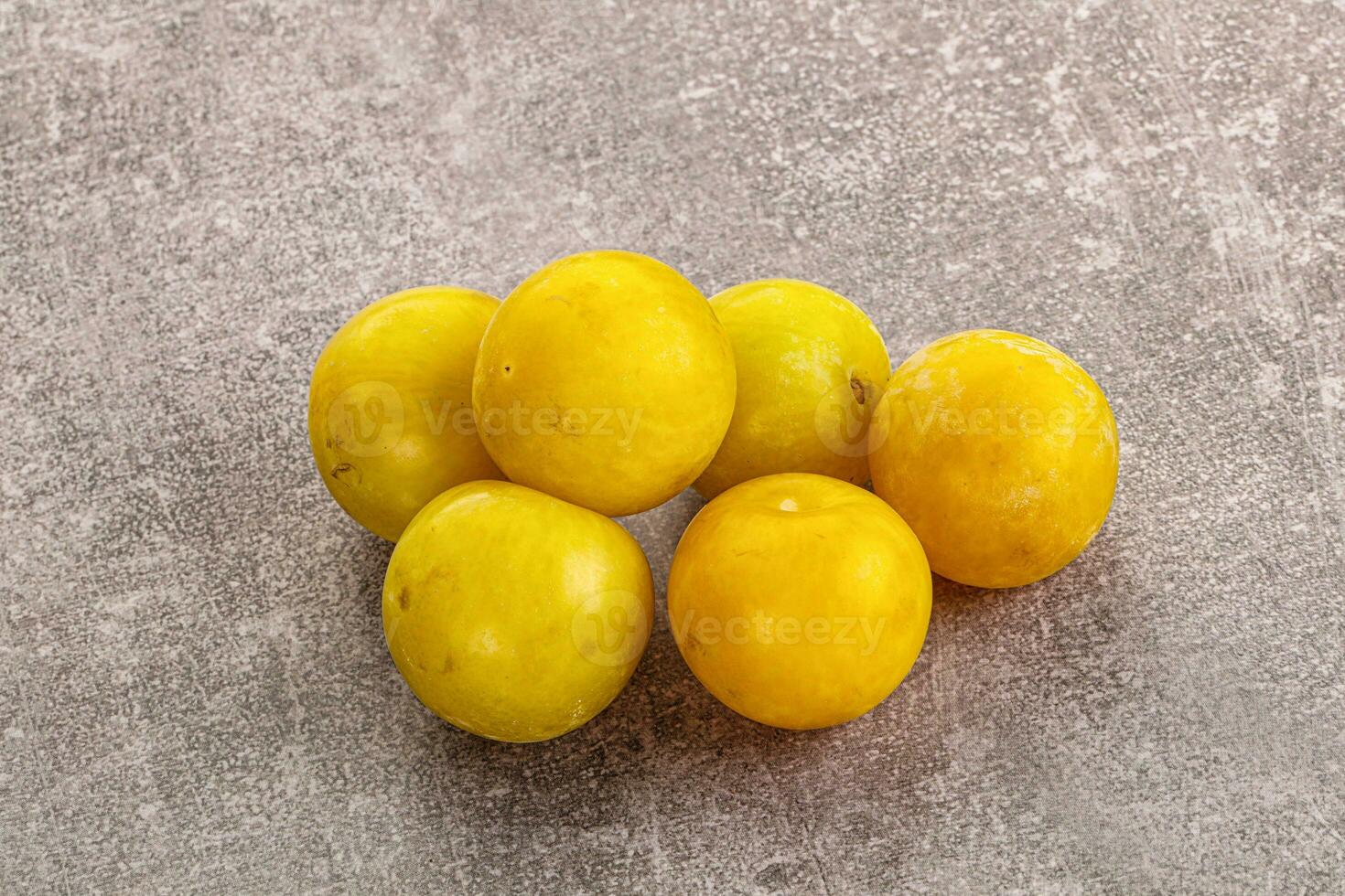 Yellow sweet plum heap fruit photo