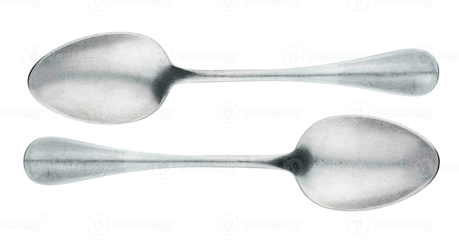 Metal spoon isolated on white background top view photo