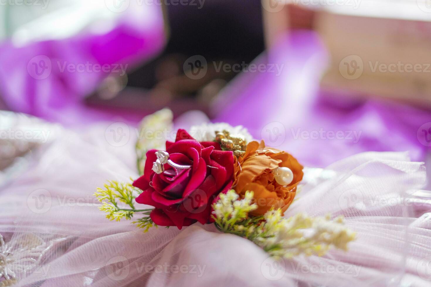 Bouquet of fresh red roses in Indian wedding photo