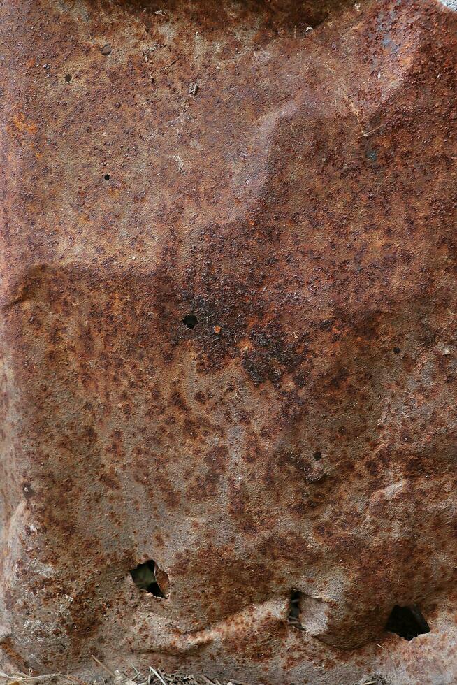 Scratched and rusted metal surface photo