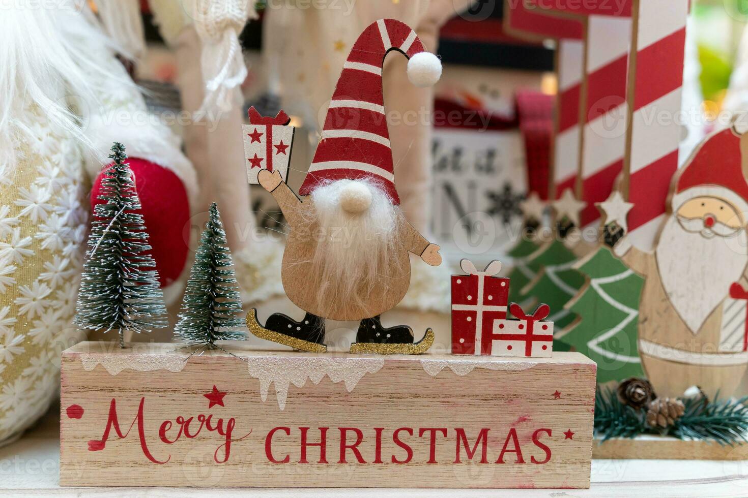 Close-up view of a wooden Christmas Santa Claus decoration. photo