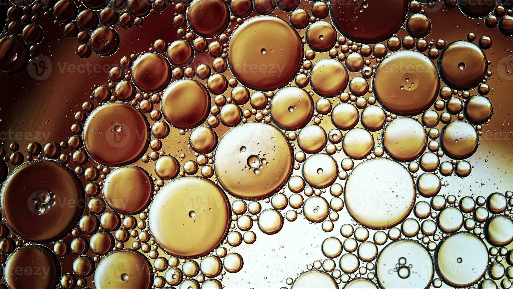 Abstract Colorful Food Oil Drops Bubbles and spheres Flowing on Water Surface photo