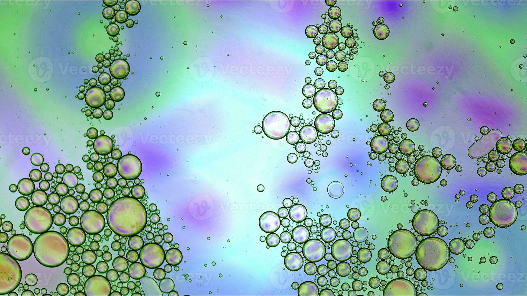 Abstract Colorful Food Oil Drops Bubbles and spheres Flowing on Water Surface photo