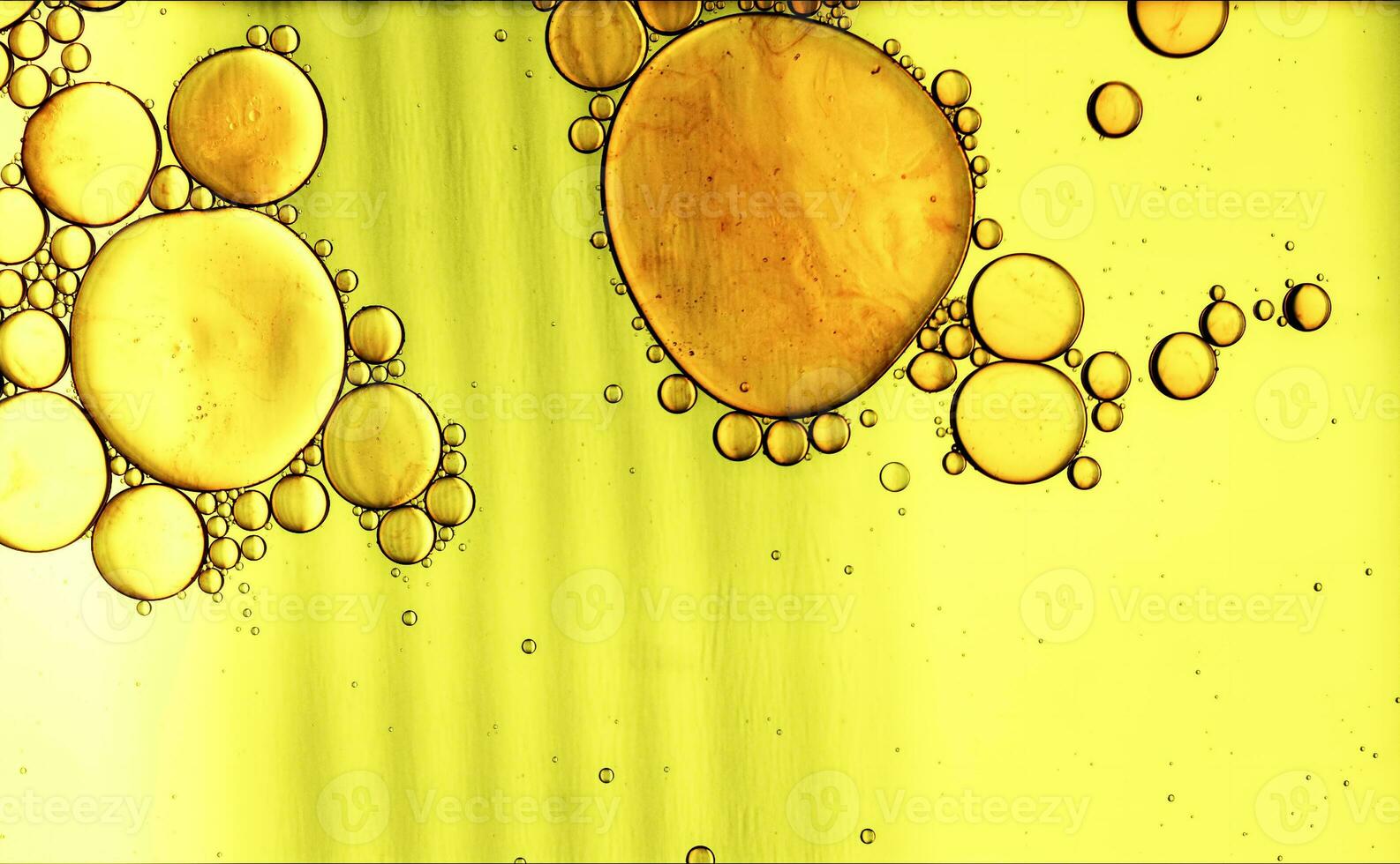 Abstract Colorful Food Oil Drops Bubbles and spheres Flowing on Water Surface photo