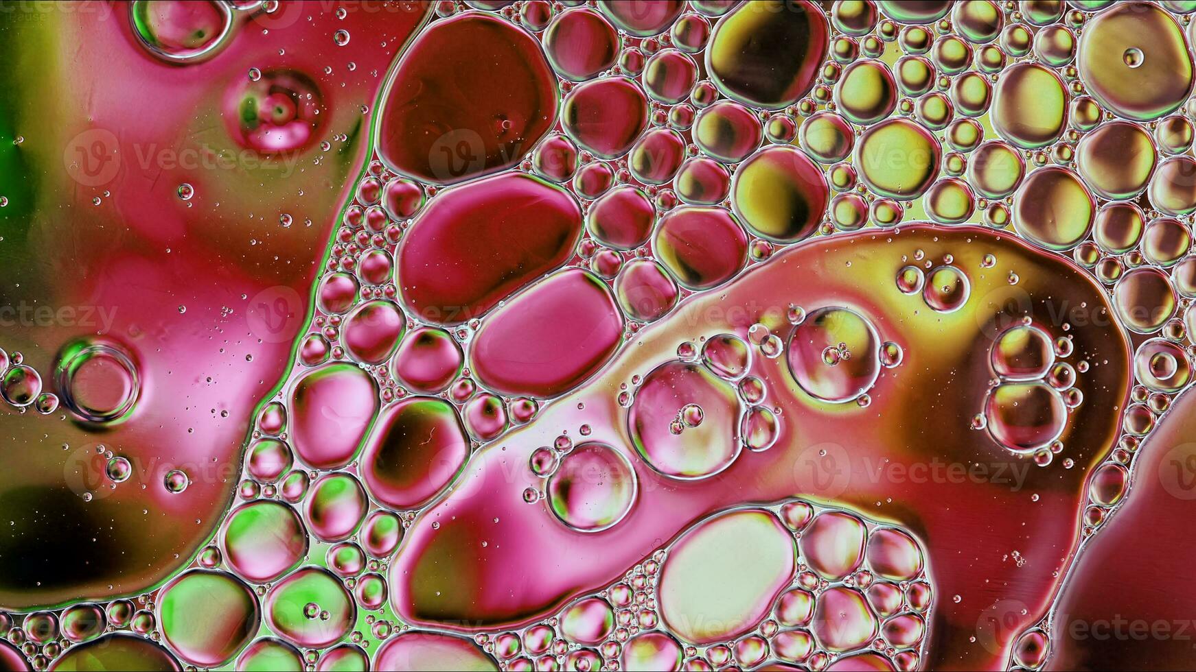 Abstract Colorful Food Oil Drops Bubbles and spheres Flowing on Water Surface photo