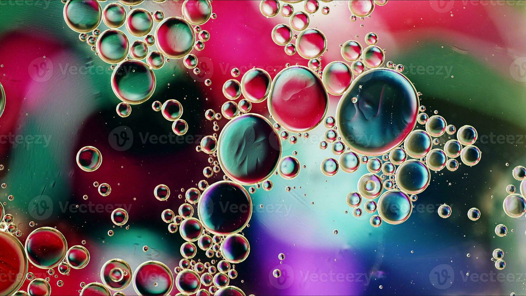 Abstract Colorful Food Oil Drops Bubbles and spheres Flowing on Water Surface photo