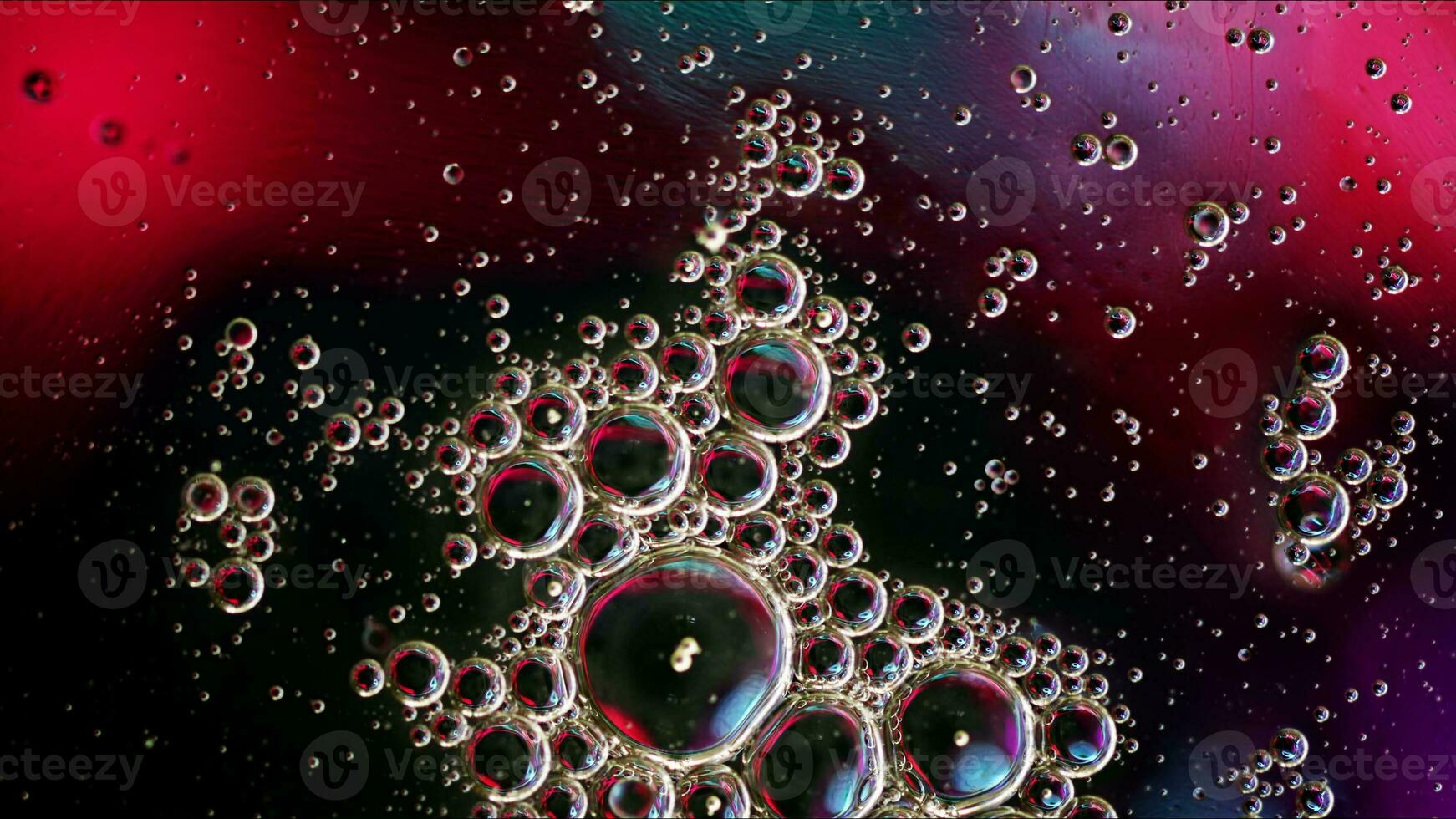 Abstract Colorful Food Oil Drops Bubbles and spheres Flowing on Water Surface photo