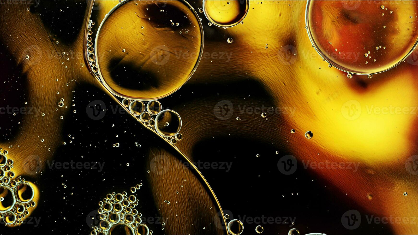 Abstract Colorful Food Oil Drops Bubbles and spheres Flowing on Water Surface photo